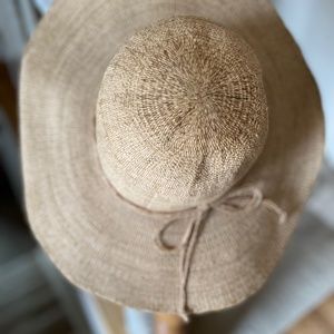 Tan wide brimmed sun hat